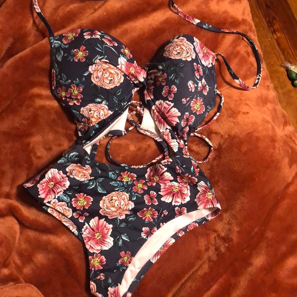 One piece swim suit.